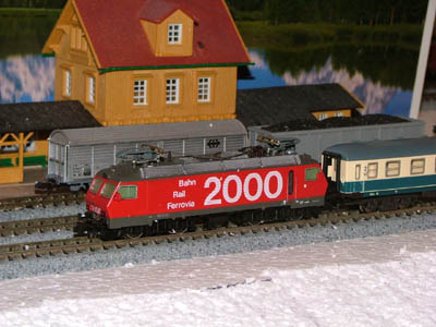 SBB Re4/4iv passes Wominsee